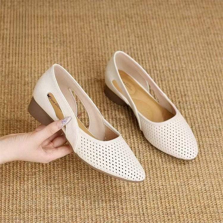 Zapatos de cuero huecos con suela