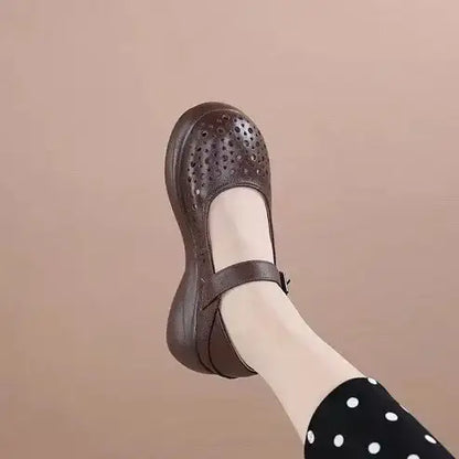 Crocs de punta redonda de cuero genuino