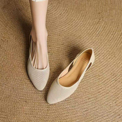 Zapatos de cuero huecos con suela
