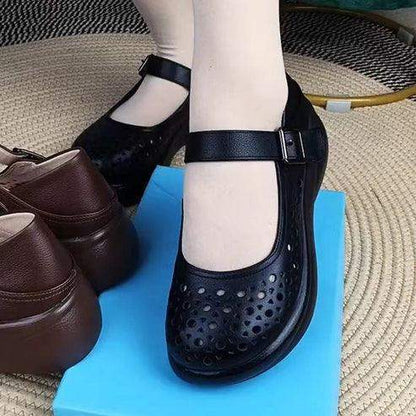 Crocs de punta redonda de cuero genuino